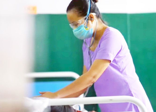 In this screengrab from a video in the Deputy Commissioner Mon’s YouTube channel, a health worker is seen on duty in one of the health care facilities in Mon district.